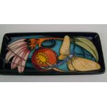 A Moorcroft Mayfly pattern tray: signed by Emma Bossons, 20cm in length (boxed).