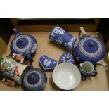 A Collection of Wedgwood Dip Blue: to include Teapots, water jugs, lidded boxes etc ( damages noted)