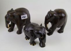 A group Of Hard Wood Carved Elephants: height of tallest 16cm(3)