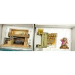 A collection of boxed Walt Disney large figures: pipe organ and The Dwarfs hearth (2)