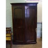 Late Victorian mahogany two door wardrobe: with storage drawer inside