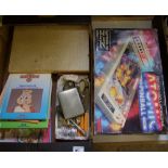 A mixed collection of items to include cased cutlery: loose cutlery, teddy ruxpin books, tomy atomic