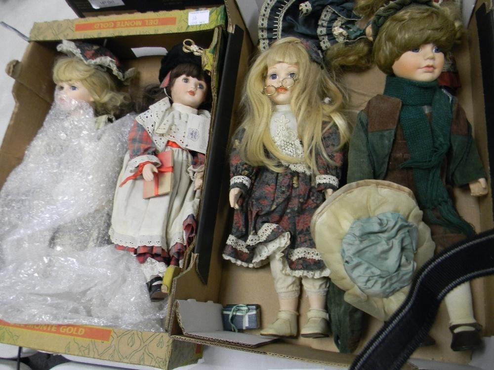 A collection of porcelain headed Gilde dolls: ( 2 trays)