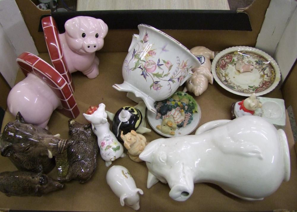 A collection of Pig Theme Pottery Items: