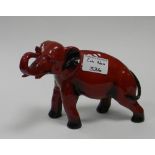 Royal Doulton Flambe model of a Elephant: Elephant with trunk in salute, height 14cm.