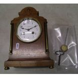 A Goldsmiths and Silversmiths Company Paris Made inlaid mantle clock: with pendulum and key.