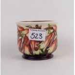 A Moorcroft floral pattern small planter: by Emma Bossons dated 2002, boxed, some crazing 9cm in