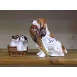 Royal Doulton model of a Cocker Spaniel with Pheasant: HN1028 together with puppies in basket HN2588