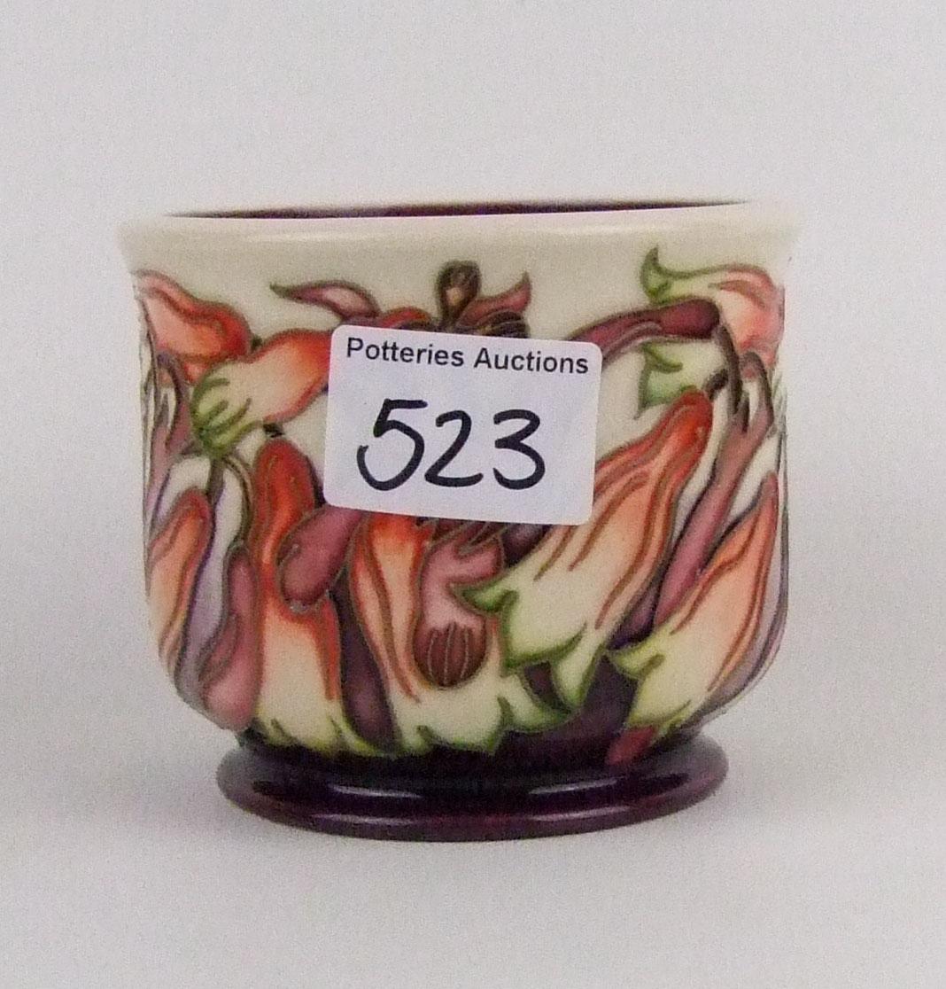 A Moorcroft floral pattern small planter: by Emma Bossons dated 2002, boxed, some crazing 9cm in - Image 2 of 2