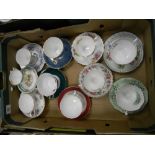 A collection of floral decorated trio's: and cup and saucers to include Royal Grafton, Royal