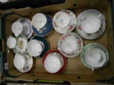 A collection of floral decorated trio's: and cup and saucers to include Royal Grafton, Royal