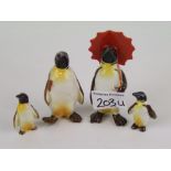 Beswick penguin with umbrella 802: penguin with walking stick 803 and 2 penguin chicks (4).