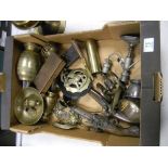 A mixed collection of metal ware items to include: horse brasses, nut crackers, wall hanging muskets