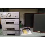 A Denon personal component system D-F10: amplifier, stereo tuner, tape deck, disc player, with