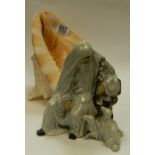 Large Conch shell together with Oriental Seated figure,