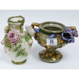 Continental Embossed Floral decorated vase: together with earlier un marked similar item(2)