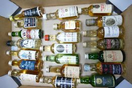 A collection of 5cl Scotch Whisky Miniatures to include: Langs, John Begg, Glen Stag, Lowoies,