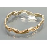 9ct gold ornate ladies bracelet: 10.