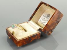 18ct gold emerald & diamond platinum set ring; slightly misshapen, size M, weight 2.3g.