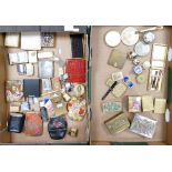 Two trays containing small collectors pieces compacts cigarette cases,