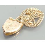 Yellow coloured metal gold chain & locket: Not hallmarked but tested as 9ct gold.