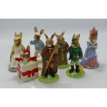 7 x Royal Doulton Bunnykins figures: Christmas Surprise DB 146 no cert, Robin Hood DB 244 no cert,