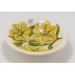 Moorcroft bowl in yellow lilies pattern: 25cm wide.