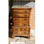 Reproduction miniature walnut chest on chest of drawers: