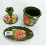 Moorcroft Hibiscus on Green Ground items to include: small planter, candle stick,