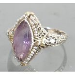 14ct white & yellow gold diamond & purple stone ring: Weight 3.4g, size O, some pearls missing.