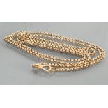 9ct gold long chain: Clip and chain marked 9ct and tested as 9ct gold.