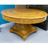 A modern walnut veneered circular dining table: With fern decoration. 81cm high x 152cm wide.