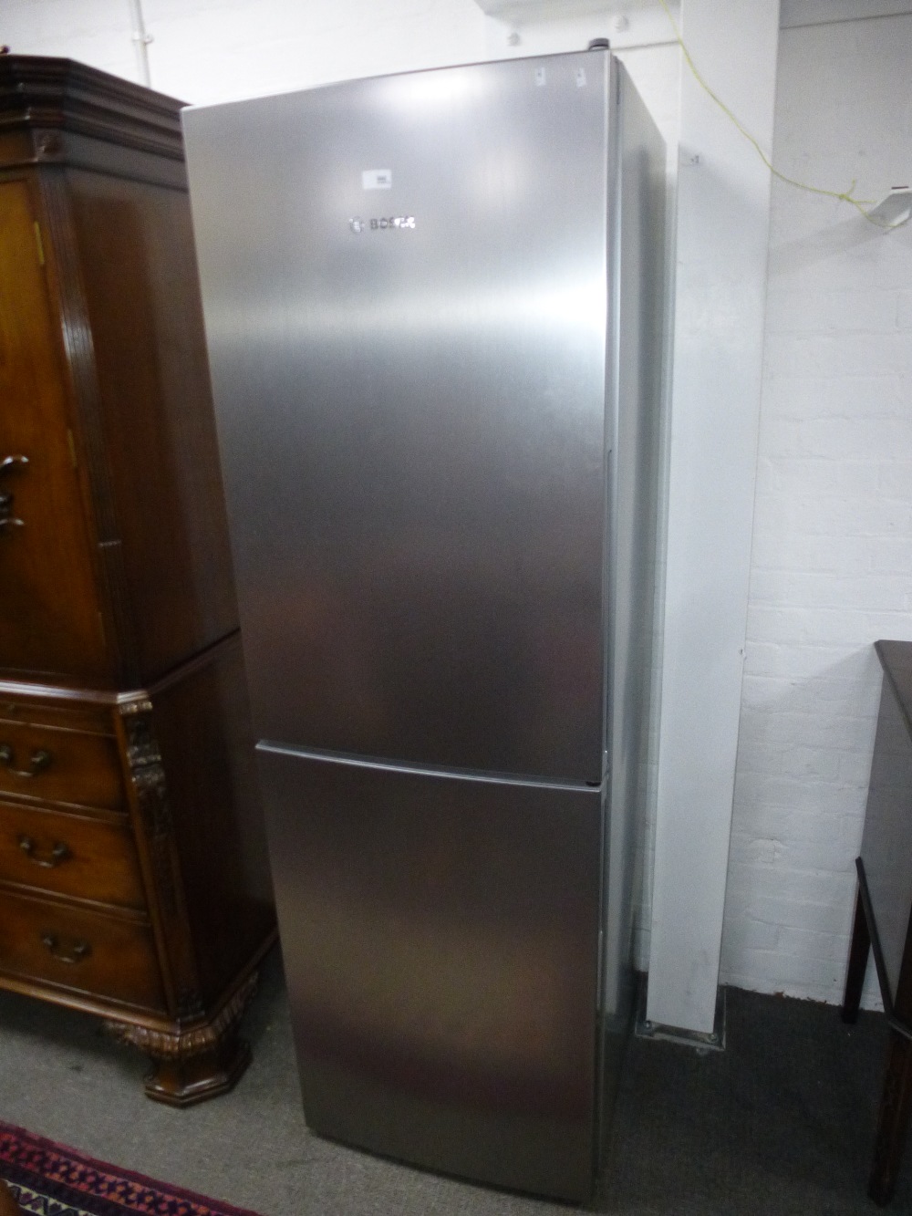 Bosch fridge/freezer with stainless steel style finish