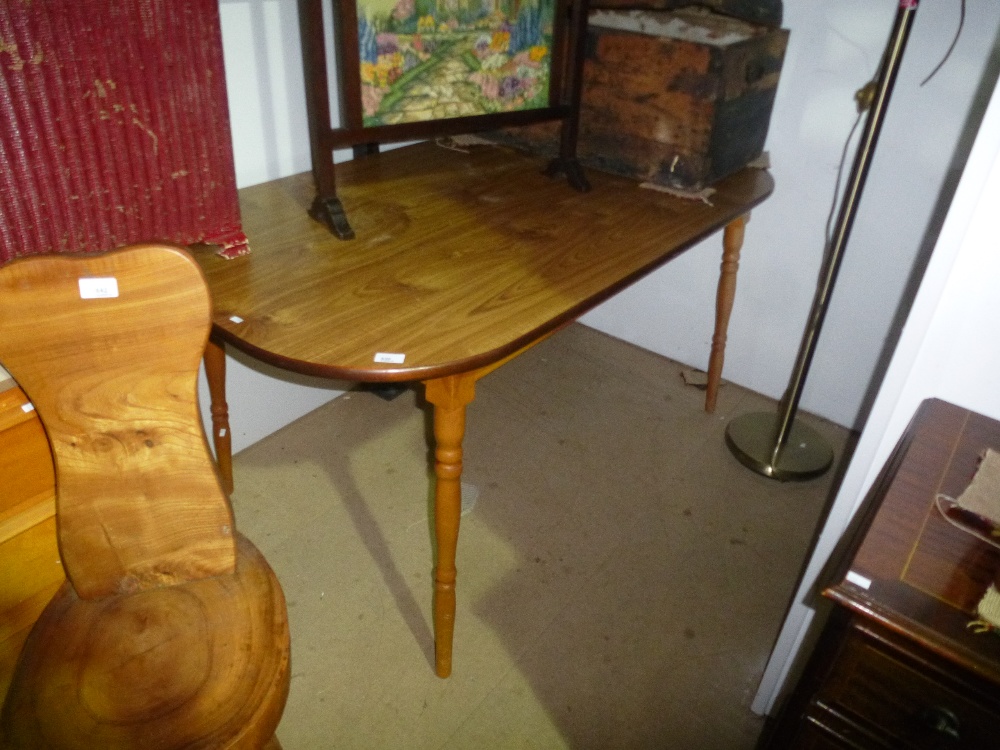 Kitchen table on turned legs