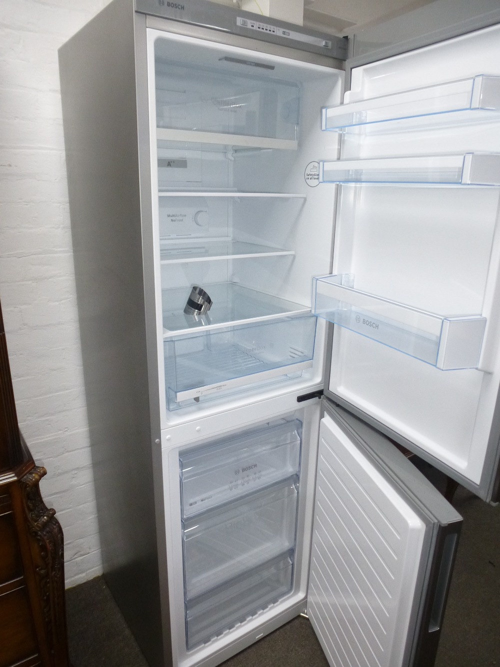 Bosch fridge/freezer with stainless steel style finish - Image 2 of 2