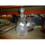 Brass and mahogany glass holder with decanter and Islamic brass candleholders