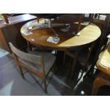 Mid century teak circular extending table and a set of 4 chairs by Macintosh