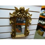 Small gold portrait mirror