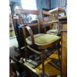 A pair of bentwood armchairs upholstered with green felt seat pads