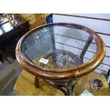 Circular pine drop flap table and a bamboo and glass coffee table