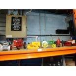 A collection of model tractors to include John Deere, McCormick Farmall and