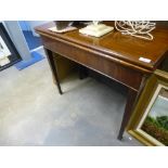 Antique mahogany tea table.