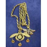 Continental gilt metal pendant / brooch in the form of 2 dragonflies, stamped 835, 6.5cm wide on a