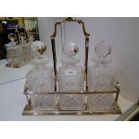 Modern heavy good quality Sheffield silver Tantalus fitted with three hobnail cut glass decanter,