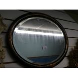 A Chinese black lacquer oval wall mirror, 56cms.