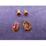 19th century yellow coloured metal pear drop shaped pendant set with pink coloured stones, pair of