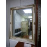 A French style white painted wall mirror, 97cms.