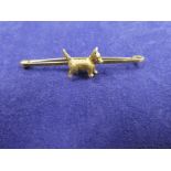 15ct yellow gold Scottie dog bar brooch, stamped 15ct, 5g.