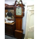 An antique oak and mahogany cross banded 30 hour long case clock having painted dial. 206cms