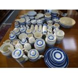 A quantity of Cornish style blue and white kitchenware by Sadler and other makers.